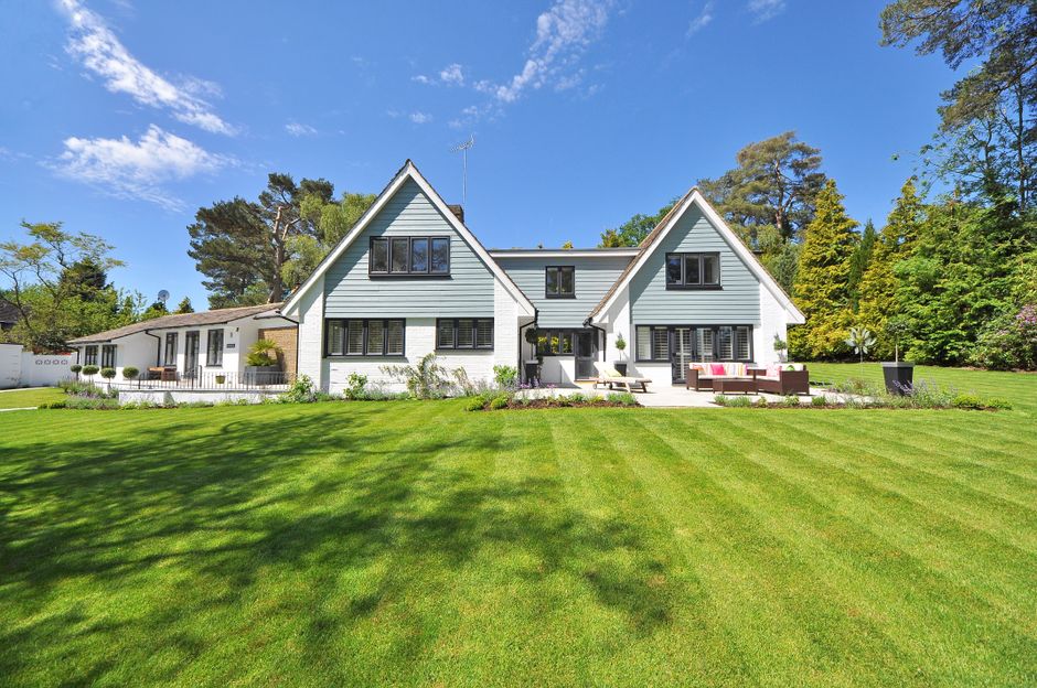 Neatly mowed lawn in front of a residential New Orleans property
